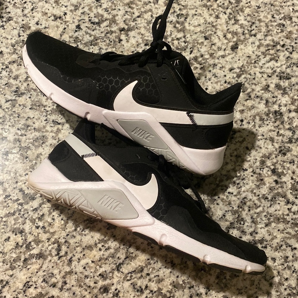 Nike athletic shoes- like new. Only worn a few times. Too small for me.